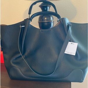 Brand new black, medium size, leather handbag